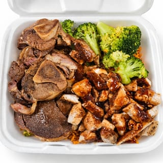 Lamb & Jerk Chicken over rice (Owner)
