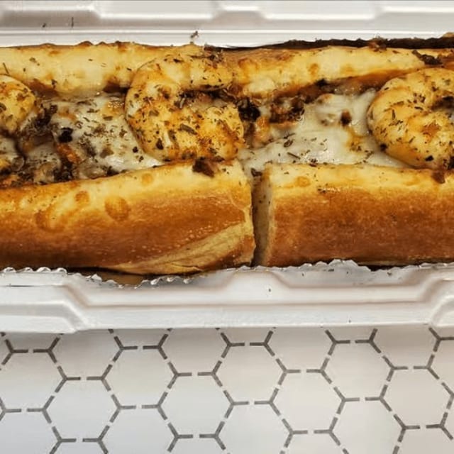 Shrimp & Salmon Cheesesteak Sandwich.