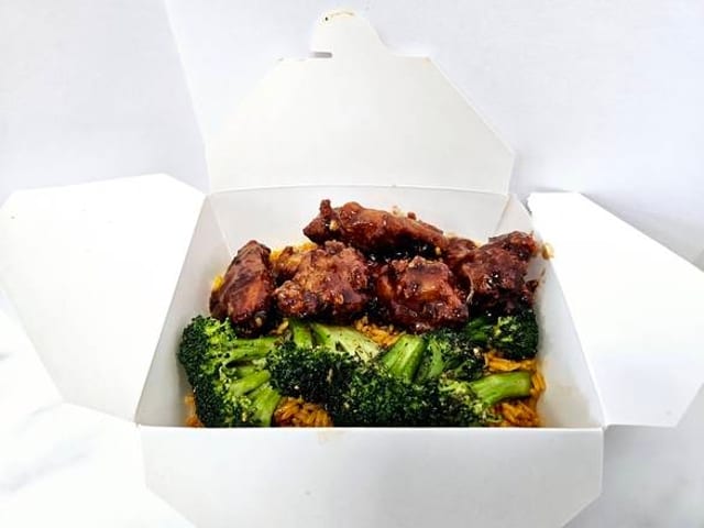 Jerk BBQ Wing Dings Over Rice.